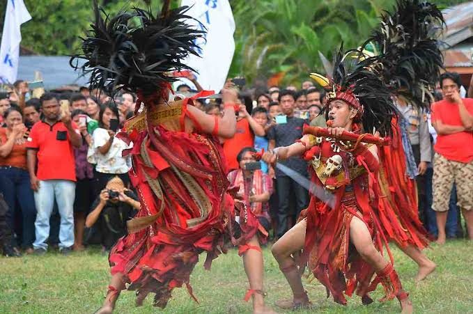 The kabrate blade-and-horn dance, performed at a village gathering